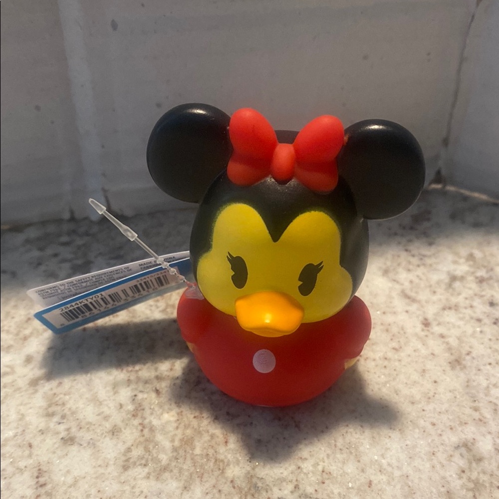Disney Minnie Mouse Rubber Duck. NWT. About 3 in. Perfect for any Disney lover.